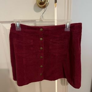 Corduroy maroon skirt. She + sky
